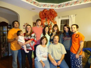 Sandra and Ken with their children and granddaughter. 